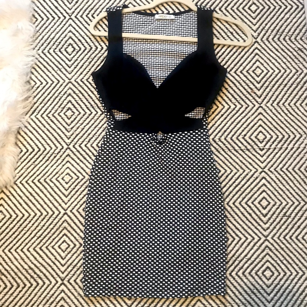 Black Cut-Out Dress *Form Fitting*
